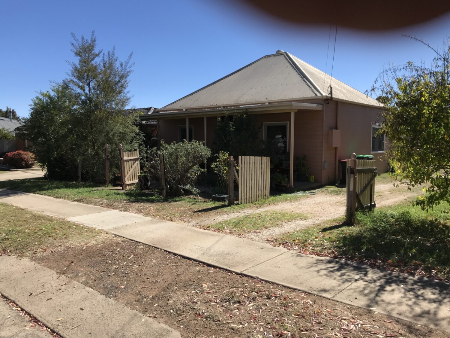 Front-view-of-cottage-before-rennovations-scaled