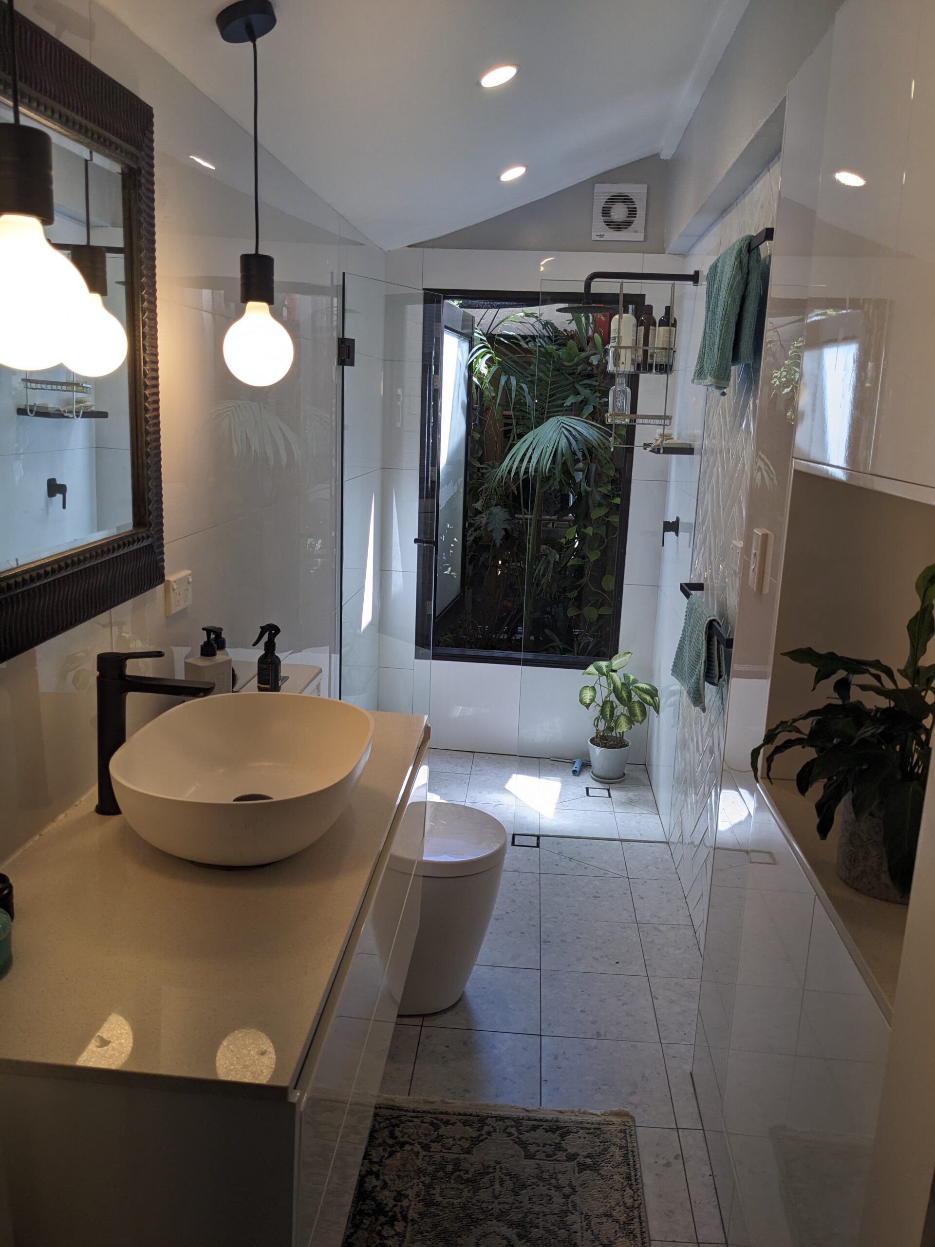 Refurbished-bathroom-opens-onto-planted-lightwell