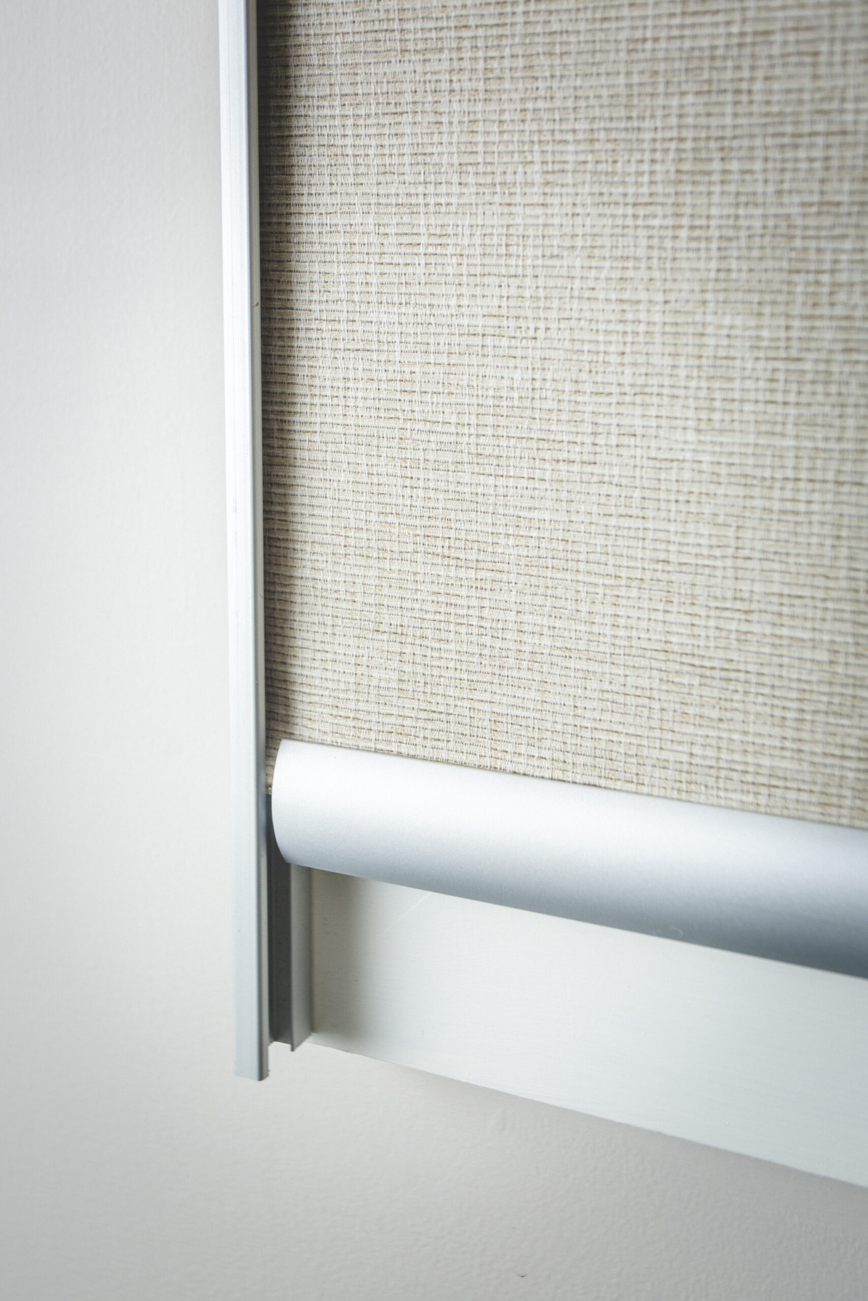 Sealed-trim-to-side-pf-roller-blind