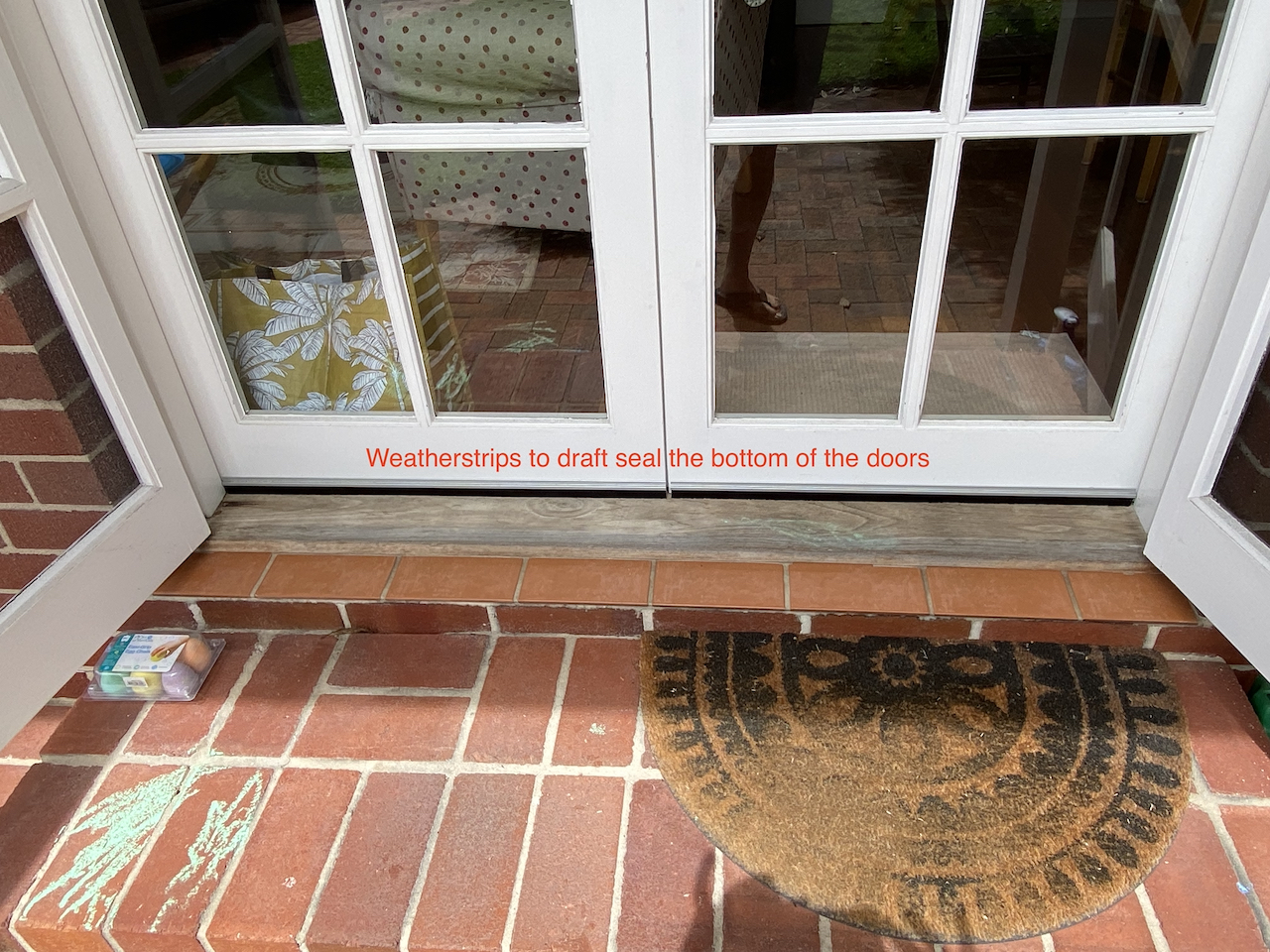 Weatherstrips to draft seal the bottom of the doors