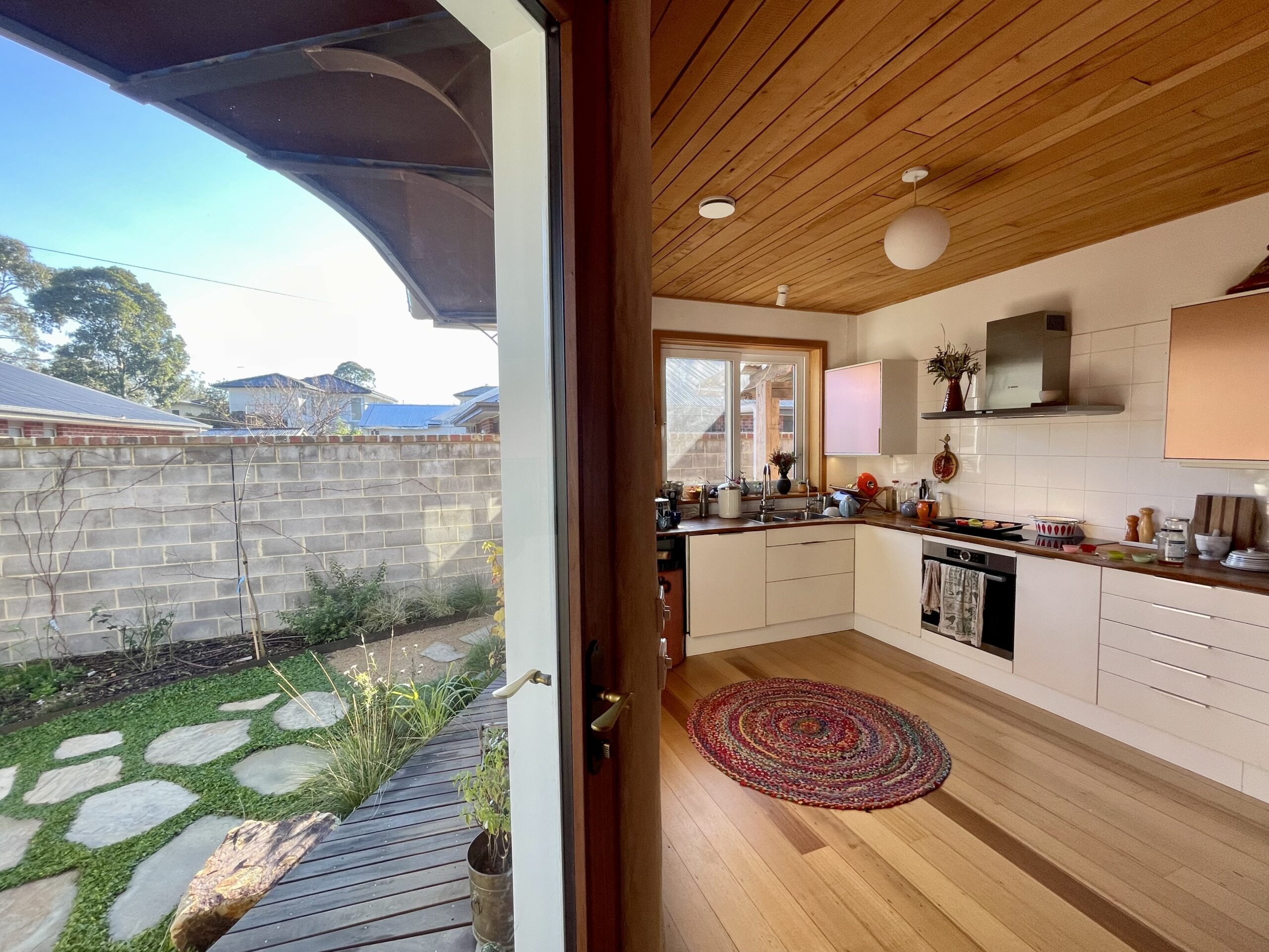 Large double glazed windows and door allow winter light to flood the living spaces IMG_9930