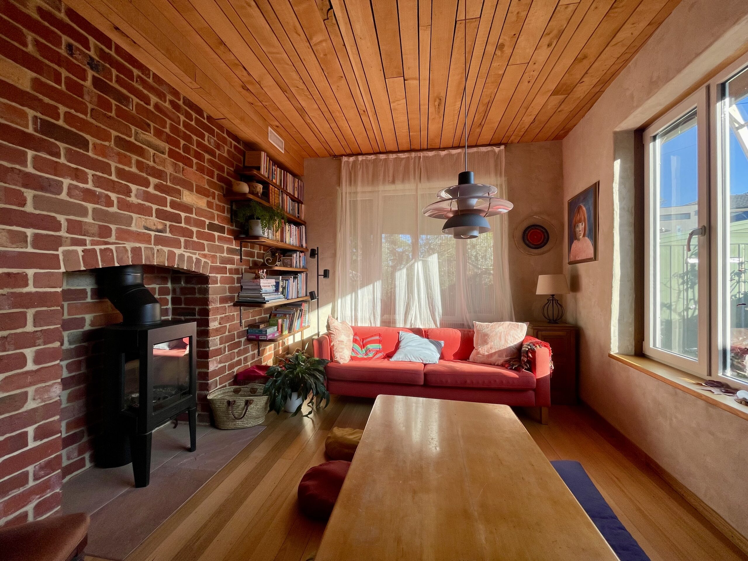 Passive solar design allows winter light into the living room IMG_9853